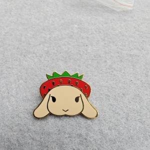 hard enamel bunny pins with long, floppy ears and  red strawberry hat