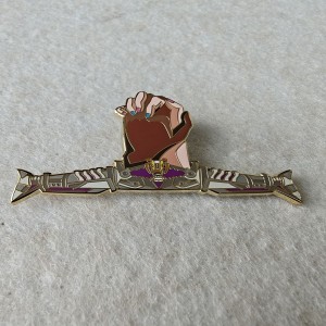 Different colors hands clasped together based on rocket hard enamel pins