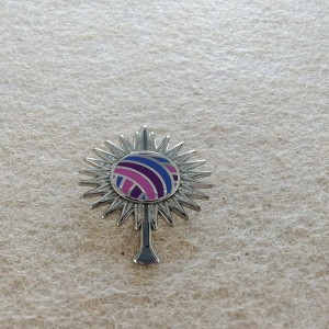 sunburst pattern surrounding a central circular element hard enamel glitter pins