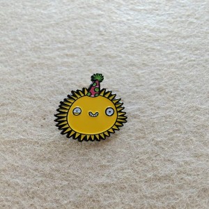 whimsical sun design with  tiny party hat soft enamel pins